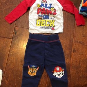 2 paw patrol outfits and 1 paw patrol pajama